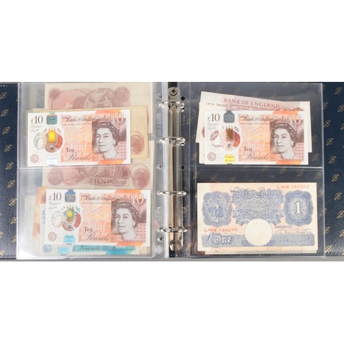 593 - A folder containing a large collection of mainly Bank of England bank notes, including uncirculated ... 