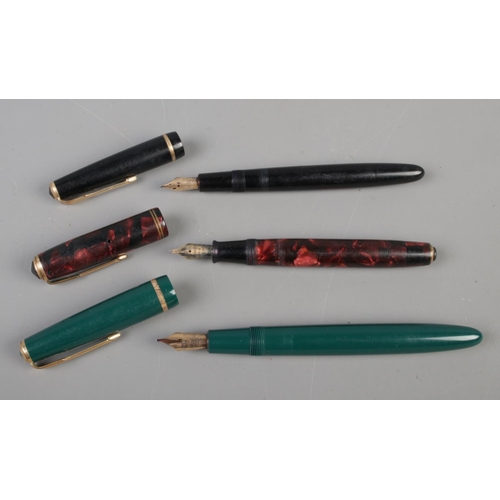 598 - Three Parker fountain pens, all having 14ct gold nibs.