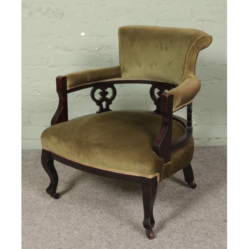 623 - A Victorian upholstered mahogany salon chair.