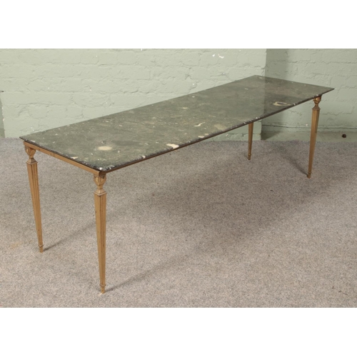 635 - A marble top coffee table raised on gilt metal base. Length 153cm.