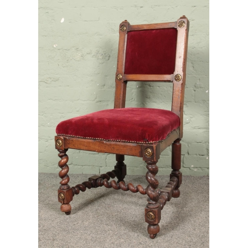 649 - An antique upholstered mahogany barley twist side chair. Having brass inset stud decoration.