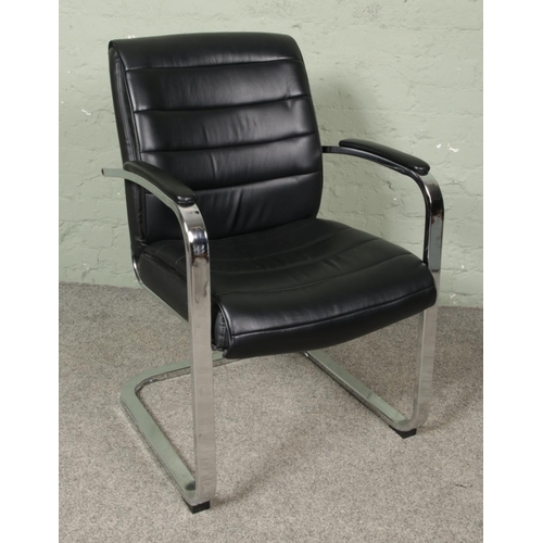 651 - A Cantilever chrome armchair. Height: 93cm, Width: 60cm, Depth: 63cm.