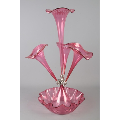 89 - A cranberry glass epergne. Height 49cm.