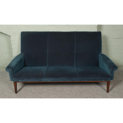 661 - A vintage blue/green velvet upholstered and teak three piece suite, possibly Scandinavian. Includes ... 