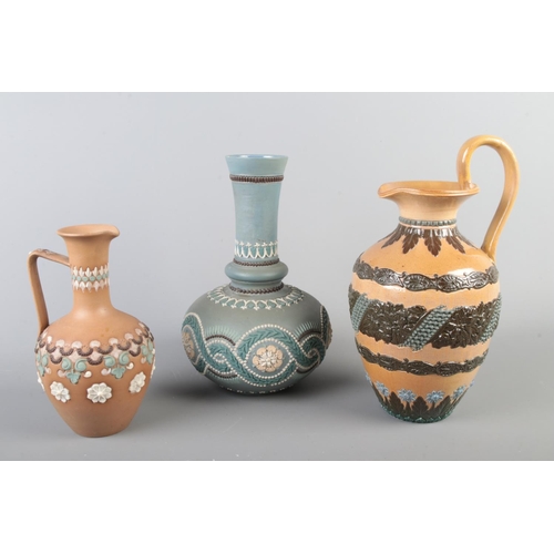 9 - Three pieces of Doulton Lambeth stoneware, including 1884 pattern Silicon bulbous vase, ewer and 188... 