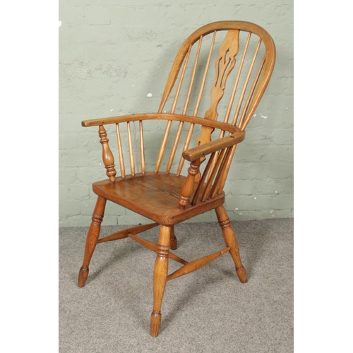 664 - An ash/elm Windsor arm chair.