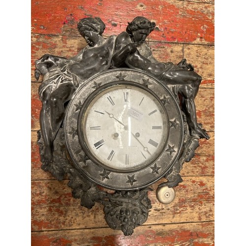 360 - An antique French cast metal wall clock for repair. The dial marked for Bright, Paris and the moveme... 