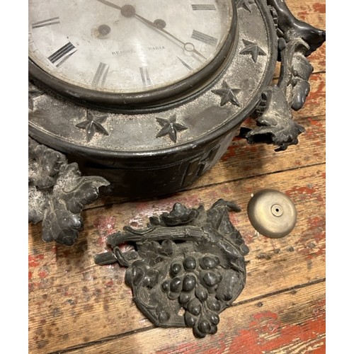 360 - An antique French cast metal wall clock for repair. The dial marked for Bright, Paris and the moveme... 