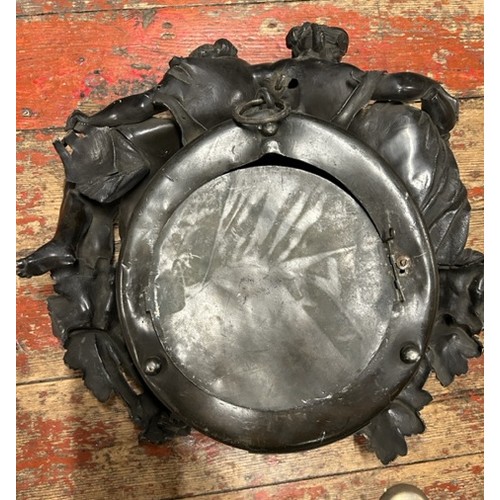 360 - An antique French cast metal wall clock for repair. The dial marked for Bright, Paris and the moveme... 