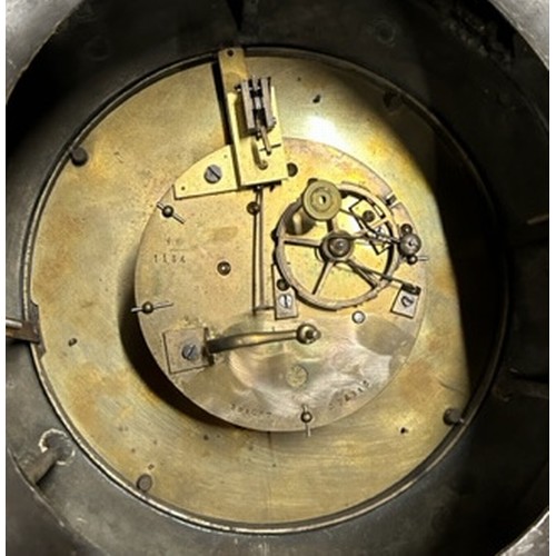 360 - An antique French cast metal wall clock for repair. The dial marked for Bright, Paris and the moveme... 