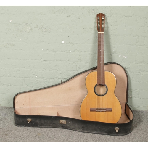 278 - A vintage classical acoustic guitar in case.