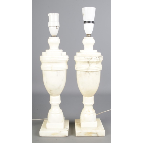 101 - A pair of marble bedside table lamps