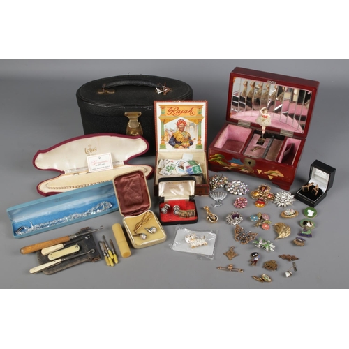 109 - Vintage jewellery collections, including a Japanese lacquer music box, pearl necklace, brooches, sta... 