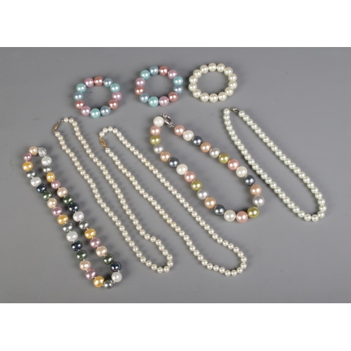 116 - A collection of simulated pearls to include assorted necklaces and bracelets.