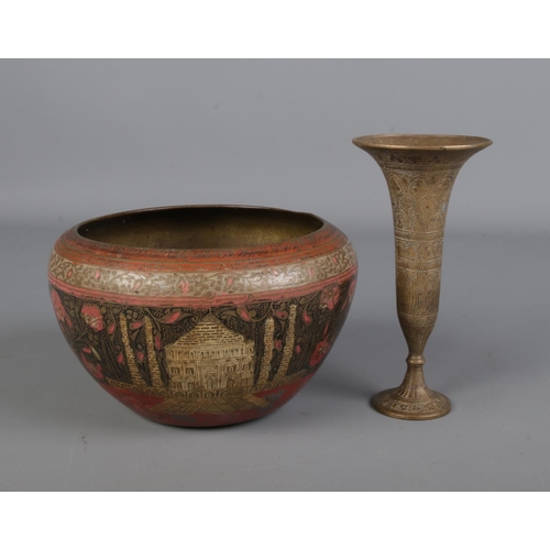 120 - An Indian enamelled brass bowl along with a similar brass trumpet vase.