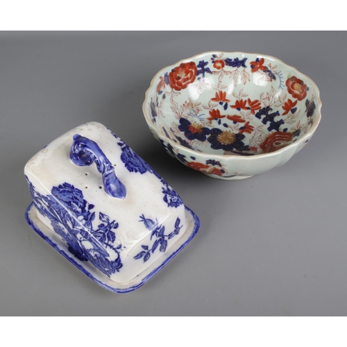 122 - Two pieces of Ironstone ceramics to include large oriental style bowl and cheese dish decorated with... 