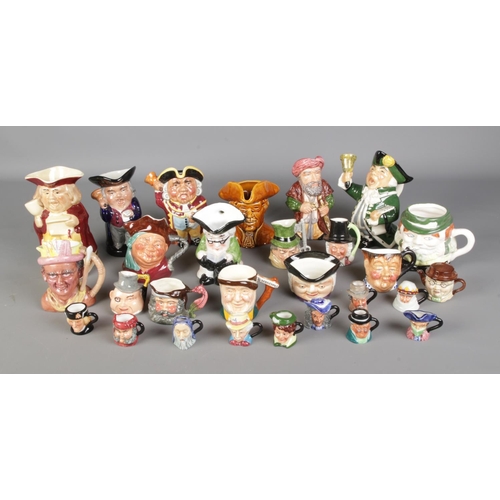 138 - A large collection of character and Toby jugs to include ten Peter Jackson miniature examples, Falco... 