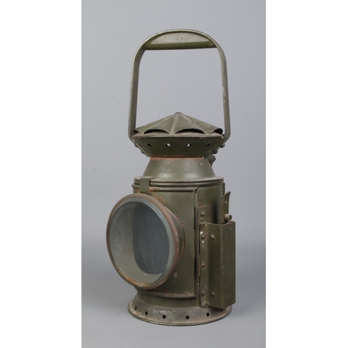 25 - A C. Eastgate & Sons, Birmingham military railway lantern. Bearing broad arrow mark to body and date... 