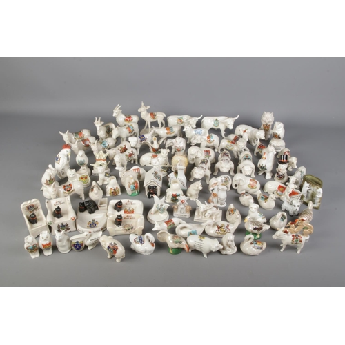 166 - A large vintage collection of various Crested Ware animal ornaments, including Jolly Good Luck Black... 