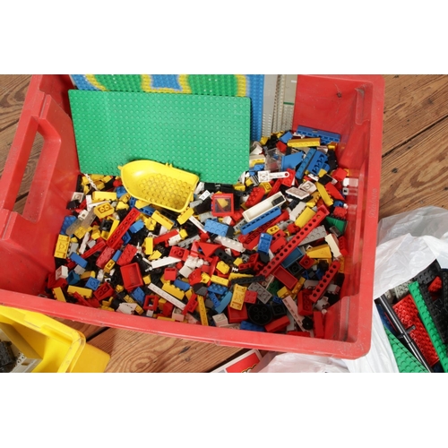 173 - Two boxes of Lego. Includes figures, bricks, wheels, platforms etc.