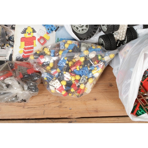 173 - Two boxes of Lego. Includes figures, bricks, wheels, platforms etc.