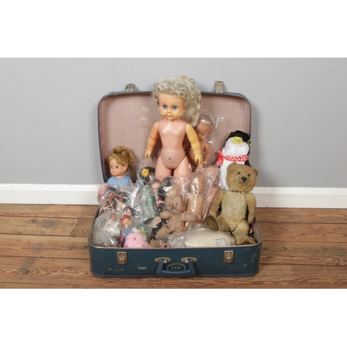 174 - A collection of vintage dolls and antique Teddy Bears, in various size and comes with a vintage blue... 