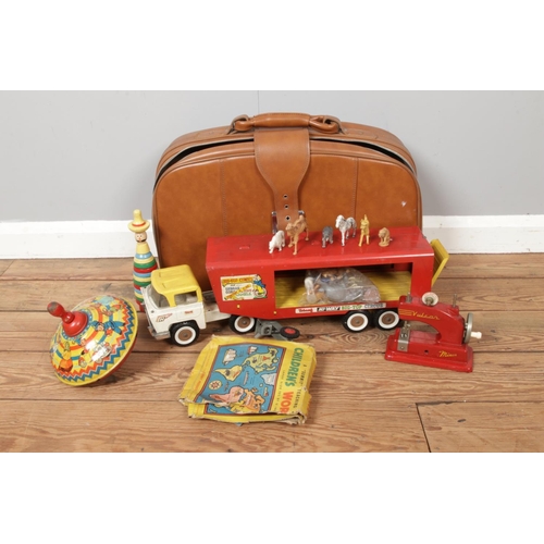 182 - A collection of vintage toys, including Triang 