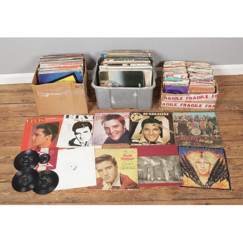 198 - Three boxes of assorted vinyl records and singles of mainly rock and pop to include U2, Elvis Presle... 