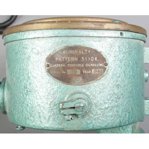 31 - An Admiralty Pattern 5110 Portable Signalling Lantern; 268825. Dated for 1945.