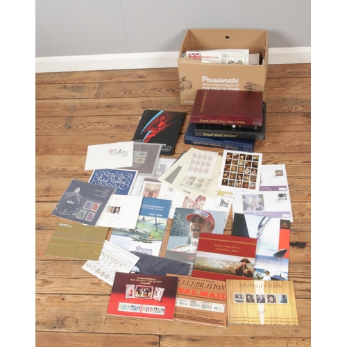 220 - A box of assorted stamps and first day covers to include used, unused and presentation pack issues. ... 