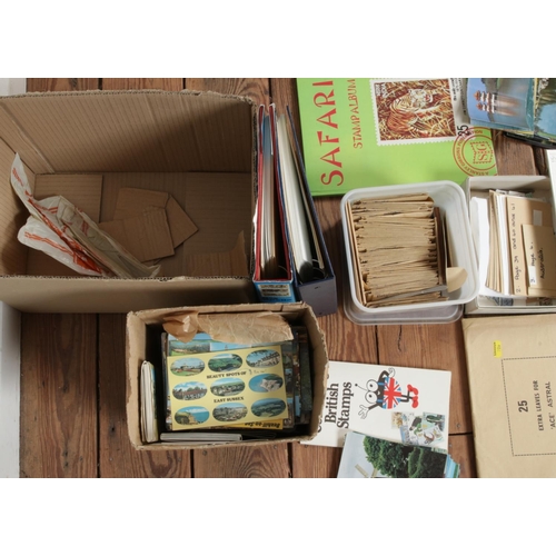 233 - A quantity of stamps and postcards, includes albums etc