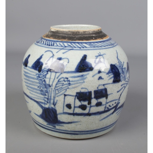 41 - An antique Chinese ginger jar decorated in underglaze blue with a landscape scene.