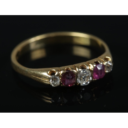 349 - An 18ct Gold Ruby and Diamond five stone ring. Size M½. Total weight: 2.11g.