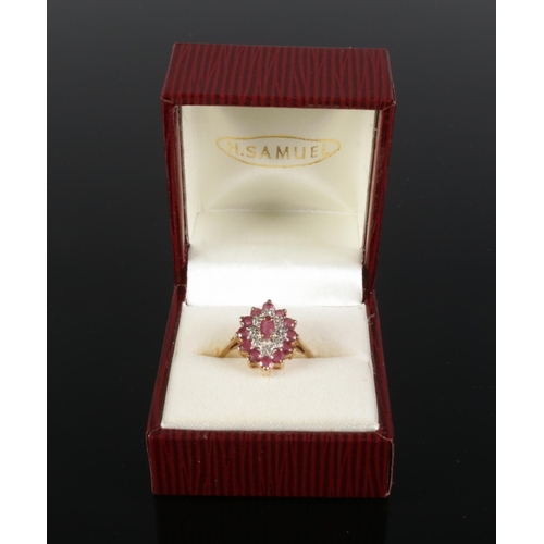 350 - A 9ct gold Ruby & diamond Marquise ring. Size N. Total weight 2.44g.