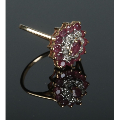 350 - A 9ct gold Ruby & diamond Marquise ring. Size N. Total weight 2.44g.