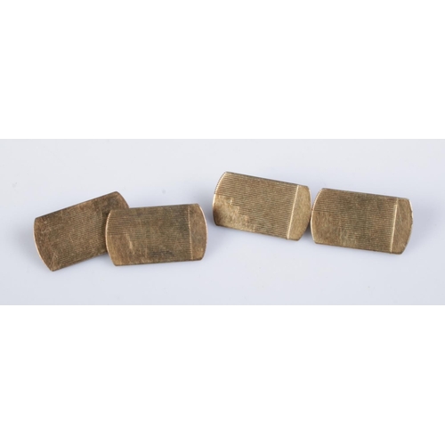 373 - A pair of 18ct gold in silver cufflinks