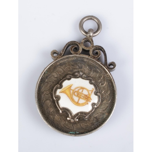 382 - A silver and enamel watch fob awarded at the Worksop Band Contest 1925