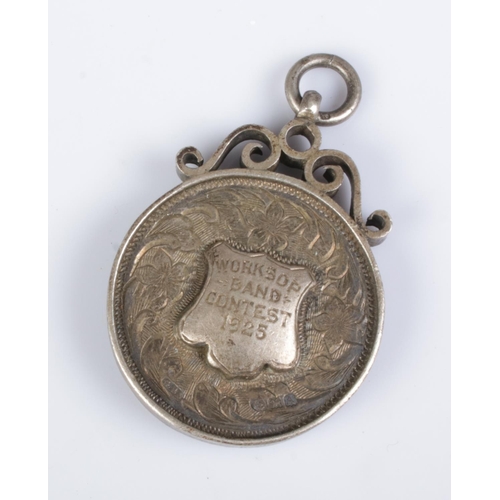 382 - A silver and enamel watch fob awarded at the Worksop Band Contest 1925