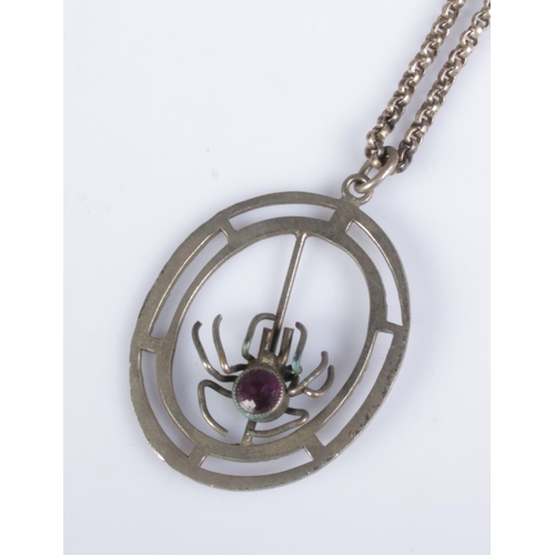 383 - A silver and Amethyst pendant on chain in the form of a spider.