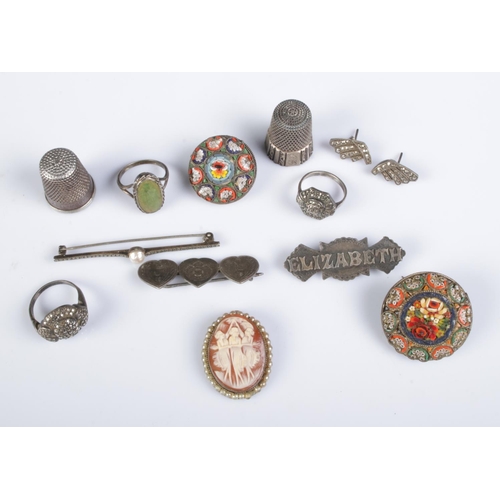 390 - A collection of silver and white metal vintage jewellery including brooches, rings, pendants etc