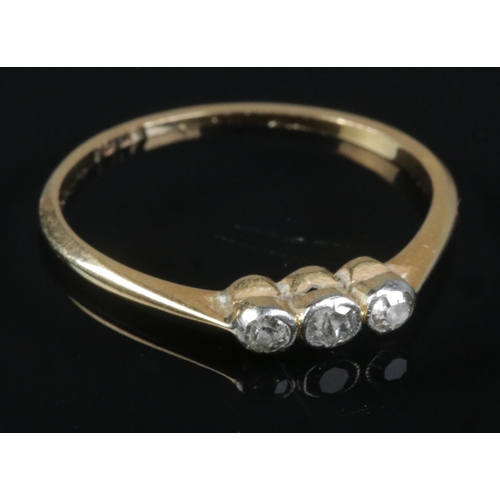 404 - 18ct Gold Diamond Three Stone Ring  (marked 