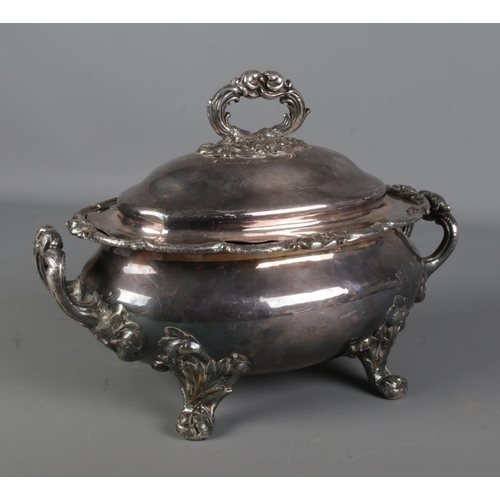 67 - A 19th century silver plate on copper tureen. Having gadrooned rim and four scrolled feet.