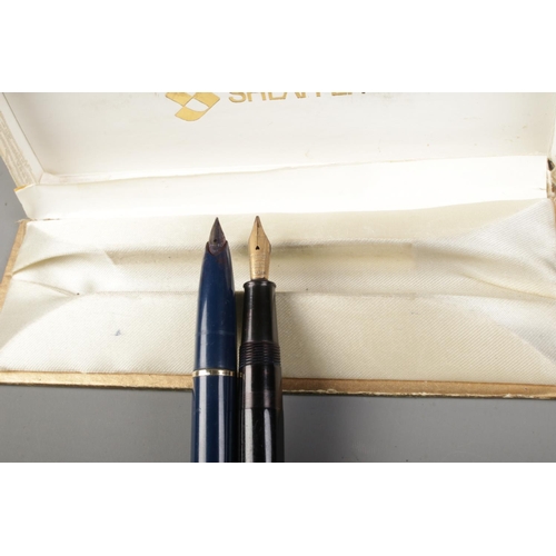 408 - Two vintage fountain pens: Boxed Sheaffer blue pen and Conway Stewart No.388 14ct gold nib pen