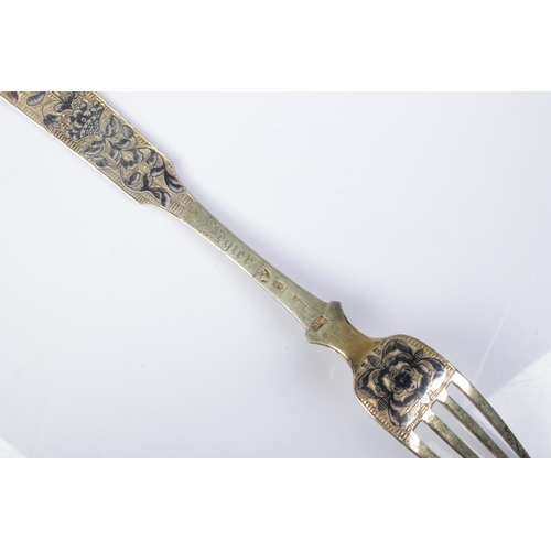 409 - A 19th century Russian silver gilt fork with niello floral decoration. Stamped 84 and dated 1835 56g... 