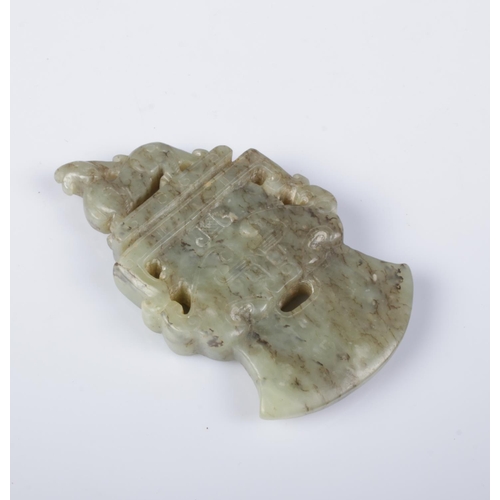 410 - A Chinese carved jade axe head pendant surmounted with a Qilin.