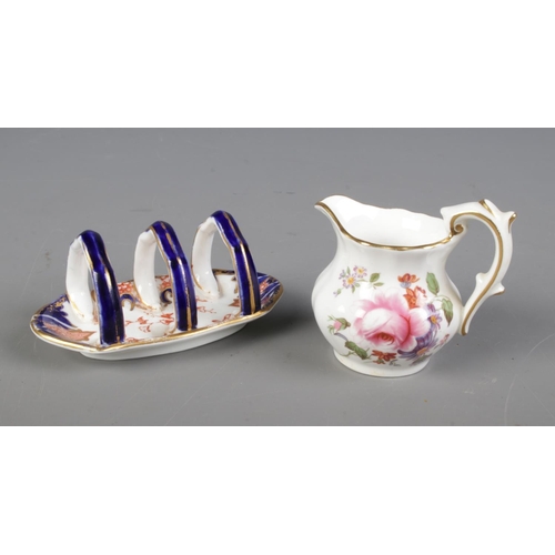 422 - Two small pieces of Royal Crown Derby. Includes three bar toast rack, in the 2712 design, and a mini... 