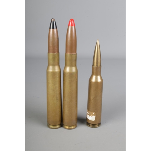 426 - .50 BMG machine gun inert rounds, Kynoch manufactured pre 1990 together with a Barrett 416 sniper ri... 