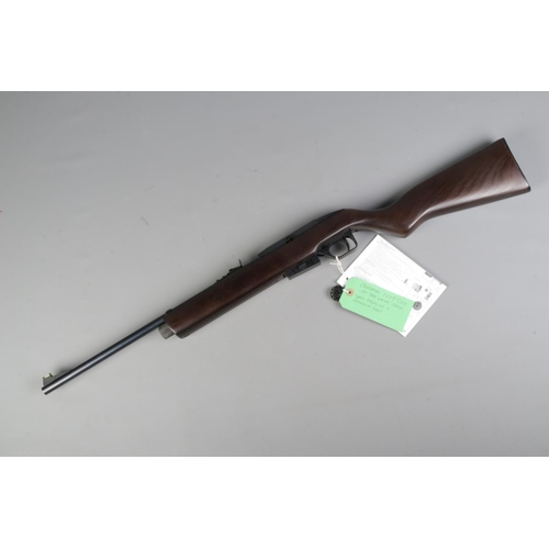 431 - A Crossman Air Guns 1077 Semi -automatic CO2 .177 air rifle with spare magazine and instruction book... 