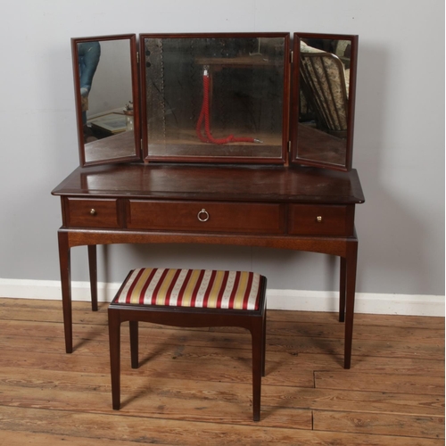 437 - Vintage Stag Minstrel Dressing Table Set with Stool. Having three drawers, triple folding mirror and... 