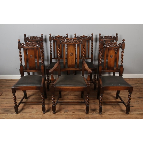 441 - A set of seven oak dining chairs with carved barley twist design manufactured by Sheard Binnington &... 